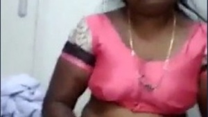 Tamil aunty's big boobs get squeezed in a hot video