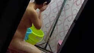 Desi Indian girl secretly recorded washing her panties in the bath