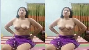 Horny Budi flaunts her breasts and masturbates with her hands