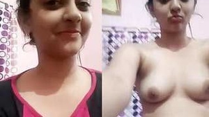 Solo Indian girl flaunts her cute breasts on camera