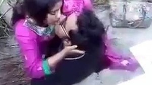 Outdoor couple shares a passionate kiss