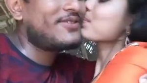 Passionate kisses between Indian lovers