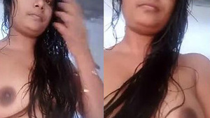 Desi aunty with long hair flaunts her XXX curves in a steamy shower video