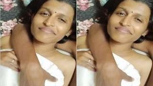 Tamil babe flaunts her big tits and pussy in a solo video