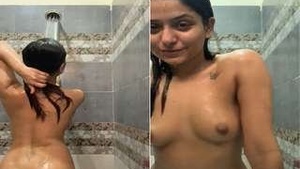 Watch a stunning girl get intimate in the bathroom