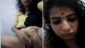 A Malayali girl bares her breasts and intimate area