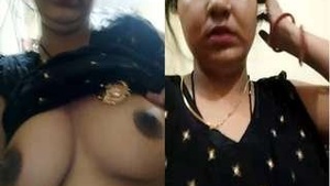 Desi Bhabha's seductive gaze and ample cleavage on display