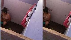 Hidden camera captures a stunning girl enjoying bath time