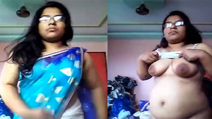 Indian village bhabhi flaunts her big boobs and juicy pussy in MMC video