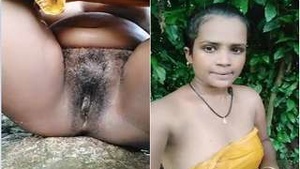 Desi bhabhi takes a bath outdoors in amateur porn video