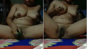 Indian girl from Assam pleasures herself with cucumber
