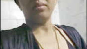 Desi bhabhi in lingerie and black bra, sizzling in the bathroom