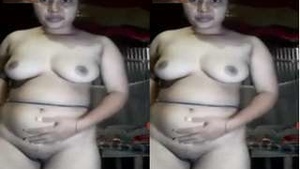 Busty Indian babe flaunts her big tits and pussy