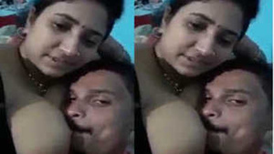 Horny amateur Indian girl teases with her big tits and invites man for a kiss