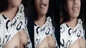 Watch a college girl play with her breasts in Bangla