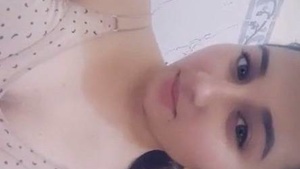Desi girl strips down and flaunts her naked body in a solo video