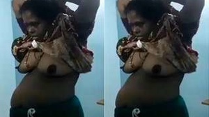 Exclusive video of Tamil bhabhi flaunting her breasts