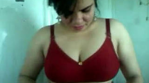 Radha Bhabhi's seductive performance in a red bra and dirty talk