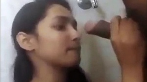 Adorable young girl gives her uncle a sensual blowjob in the bathroom