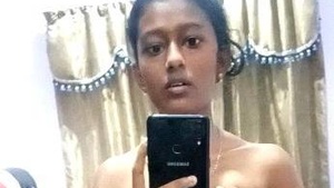 Nude Indian teenager pleasures herself in a solo video