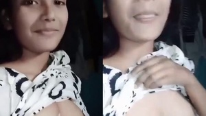 College girl flashes her perky boobs in a steamy video