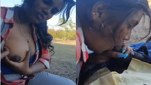 Exclusive video of a cute Indian girl showing off her boobs and giving a blowjob