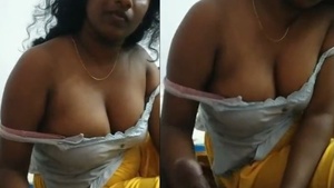 Big-breasted Tamil girl gives a handjob
