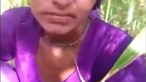 Mature couple indulges in outdoor sex in village