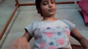 Indian schoolgirl pleasures herself with audio in solo video