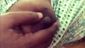 Desi bhabhi's big boobs get some loving in this hot video