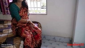 Mature woman in red saree gives a hardcore handjob and blowjob to local boy in official video
