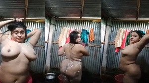 Big boobs and big ass Indian village girl in the tub