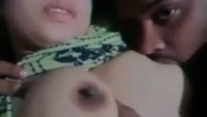 Busty babe gives a blowjob to her boyfriend