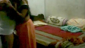 Family-friendly couple enjoys bedroom sex in classic Indian setting
