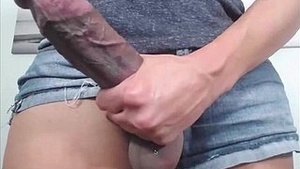 Watch a stunning shemale show off her massive cock in this steamy video