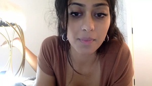 Watch a stunning Indian girl get naughty on webcam in this steamy video