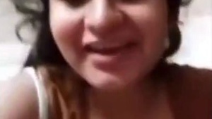 Watch a stunning babe flaunt her ample cleavage in a video call